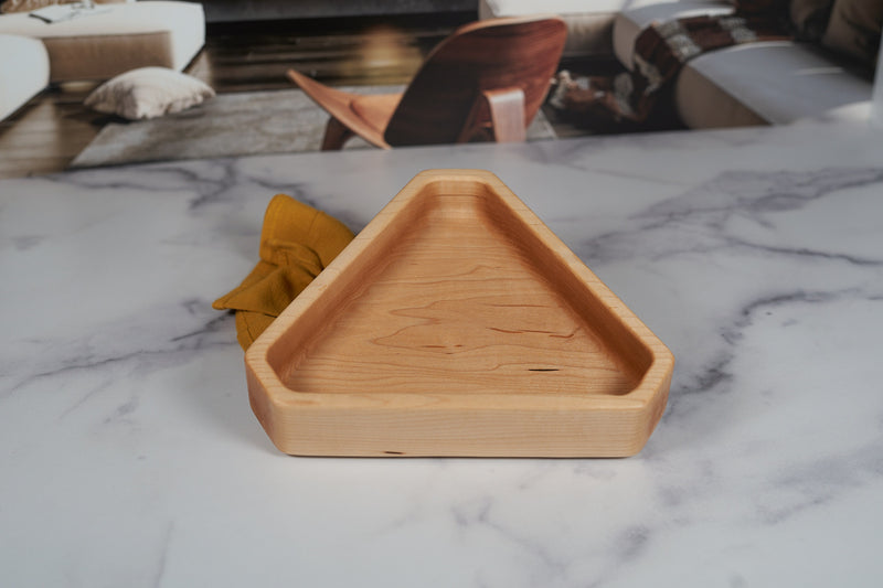 Chamfered triangle hard maple catchall tray by Kineo Mountain Woodsmithing, 9x8 inches, with smooth finish and natural wood grain.
