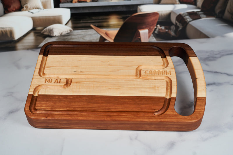 Black Walnut, Maple, and Cherry Duo-Zone Cutting Board, 16x10 inches, crafted by Kineo Mountain Woodsmithing, featuring two-tone wood design.
