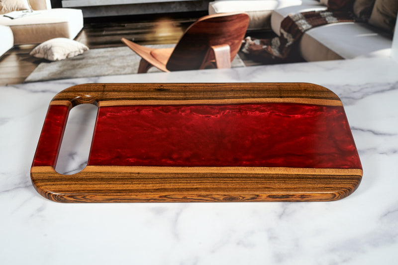 Bocote River Charcuterie Board by Kineo Mountain Woodsmithing, 18 x 10 inches, showcasing rich wood grain and handcrafted design