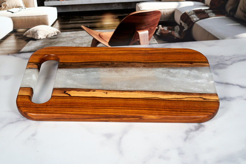 Canarywood River Charcuterie Board by Kineo Mountain Woodsmithing, 18x10 inches, showcasing the natural wood grain and river design.