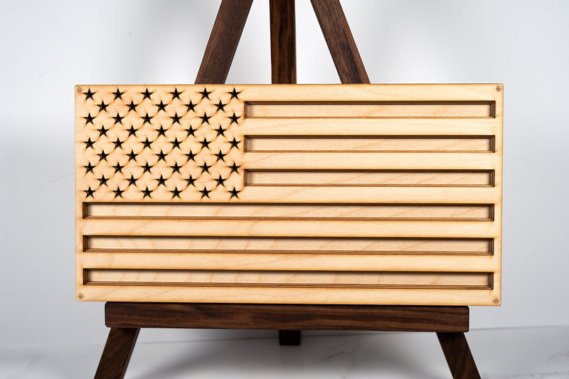 Wooden American flag wall art by Kineo Mountain Woodsmithing, featuring rustic wood design and patriotic decor.