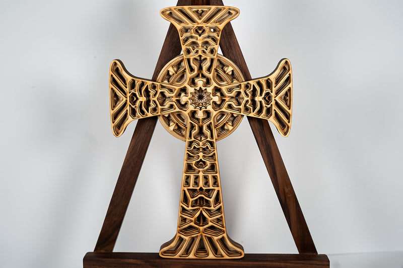 Geometric wooden cross wall art by Kineo Mountain Woodsmithing, featuring intricate geometric design and natural wood finish.