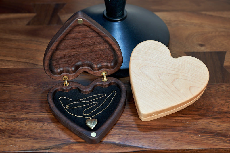 White River Keepsake Box by Kineo Mountain Woodsmithing, handcrafted wooden storage box with intricate carved details.