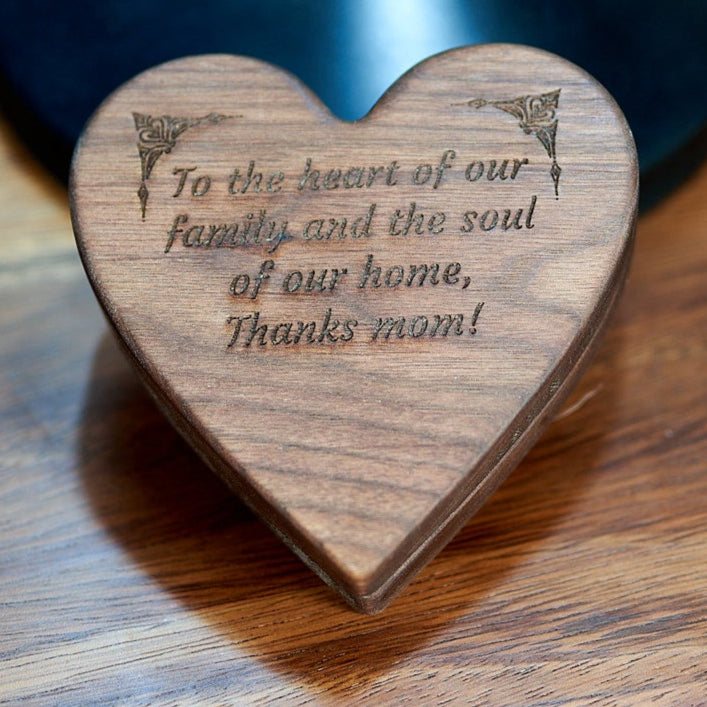 Custom laser engraved keepsake box lid by Kineo Mountain Woodsmithing, showcasing detailed woodwork and personalized design.