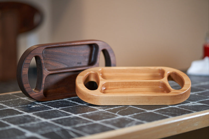 Kineo Mountain Woodsmithing Mt. Bross serving tray made of polished wood with handles for serving and display.