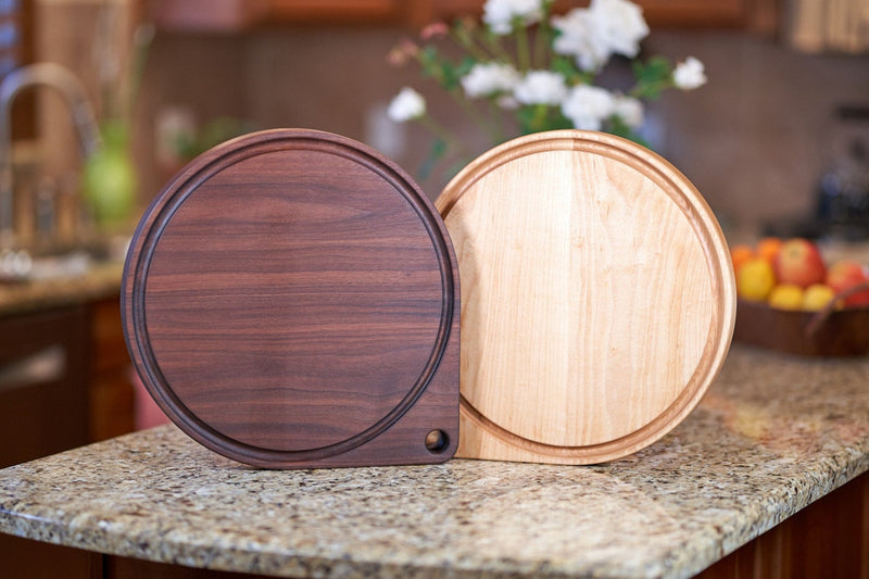 Crestone Needle cutting board by Kineo Mountain Woodsmithing showing a wooden board with natural wood grain and smooth finish.
