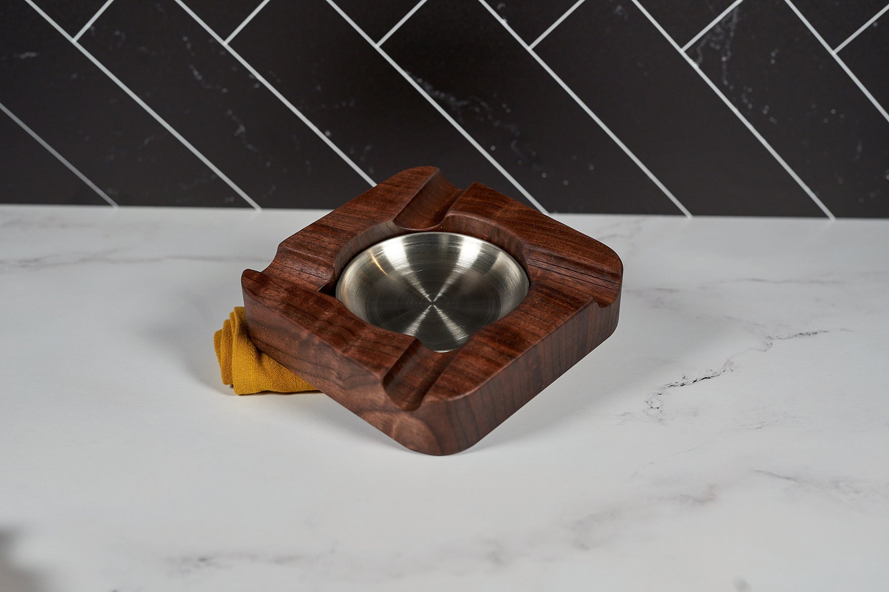 Kineo Mountain Woodsmithing Eagle River Cigar Rest made of polished wood with carved eagle design for cigar placement.