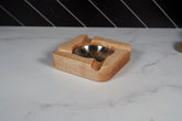 Kineo Mountain Woodsmithing Eagle River Cigar Rest with carved eagle design, made from polished wood for cigar placement.