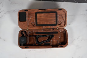 Kineo Mountain Woodsmithing travel gaming case with wood finish and secure latch, designed for portable gaming gear.