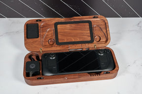 Kineo Mountain Woodsmithing travel gaming case open with gaming accessories inside, durable wooden exterior and secure latch.