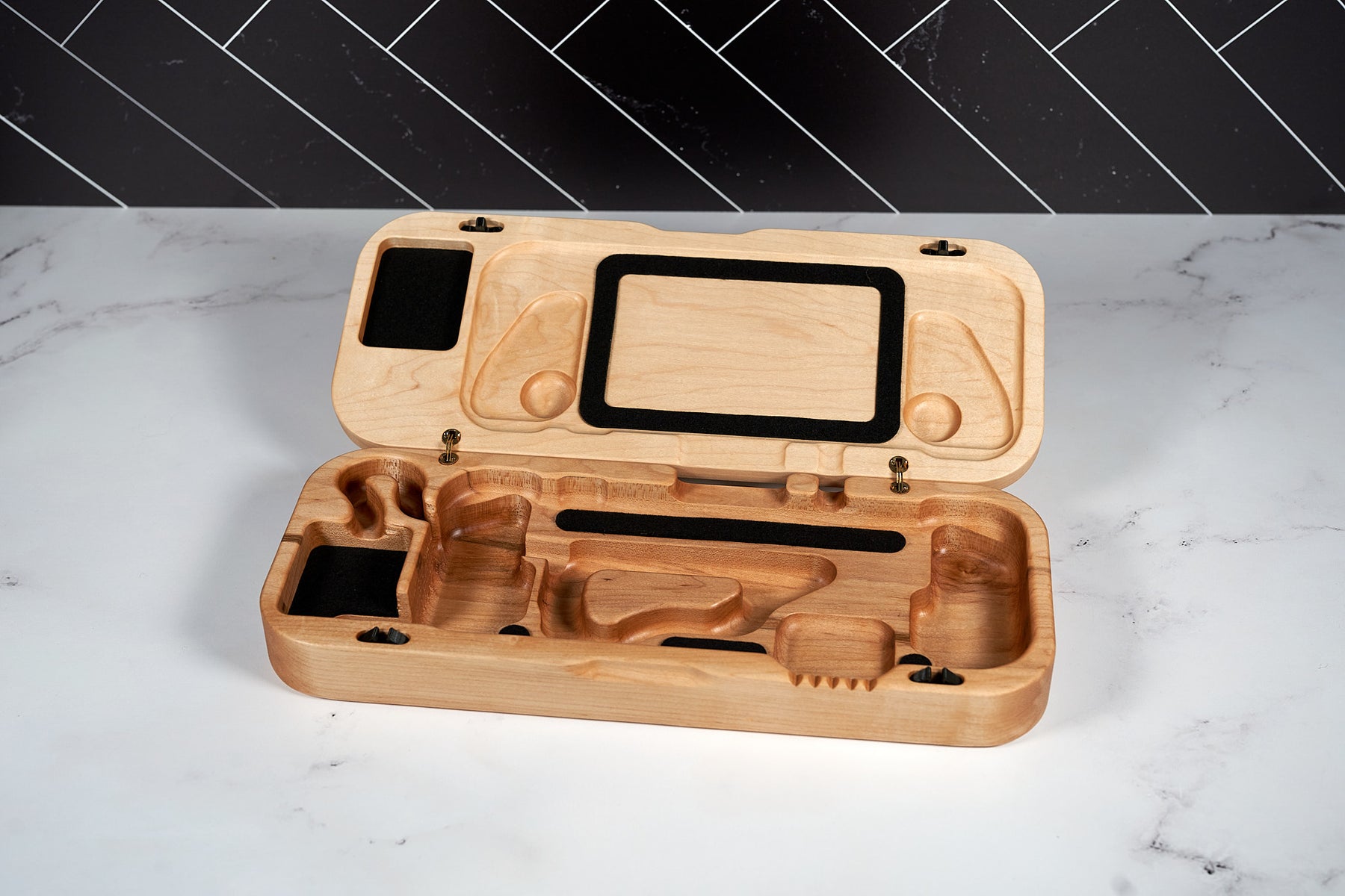 Kineo Mountain Woodsmithing travel gaming case with wooden finish and secure latch for portable gaming storage.