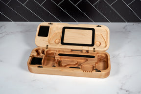 Kineo Mountain Woodsmithing travel gaming case with wooden finish and secure latch for portable gaming storage.