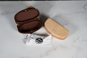 Kineo Mountain Woodsmithing sunglasses case made of wood with a smooth finish, designed to protect eyewear.
