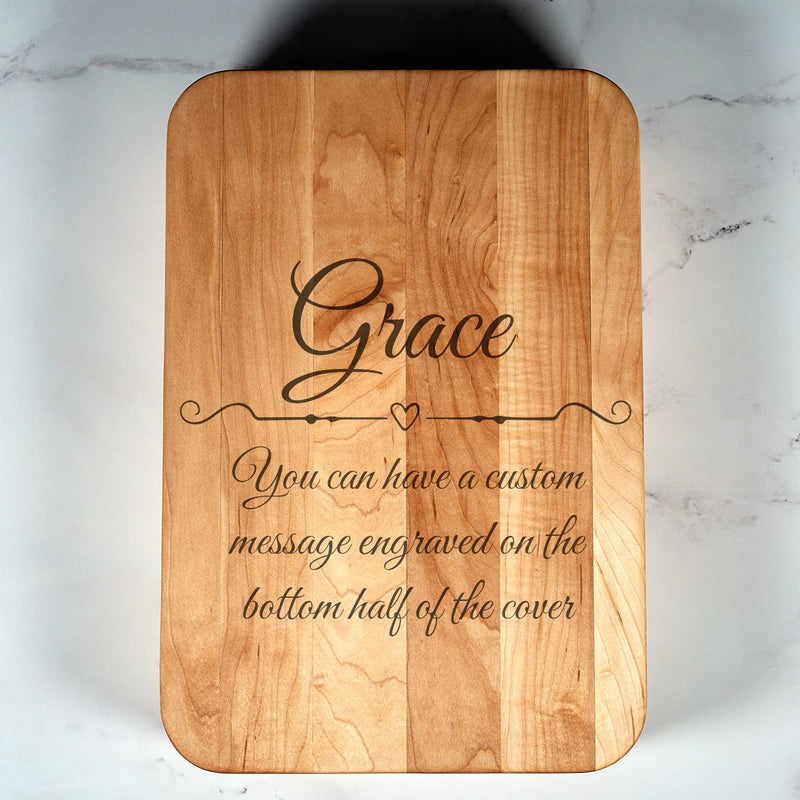 Custom laser engraved jewelry book cover by Kineo Mountain Woodsmithing, featuring intricate wood engraving details.