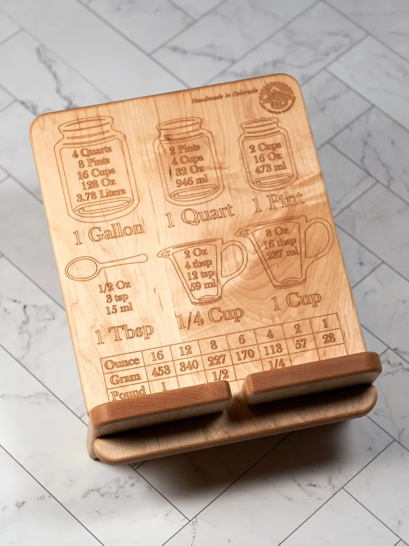 Hard maple cookbook stand with a laser-engraved measurement conversion chart across the face.