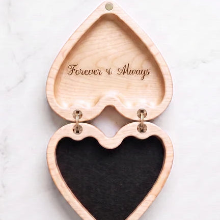 Open maple heart keepsake box with a custom message engraved inside the lid.