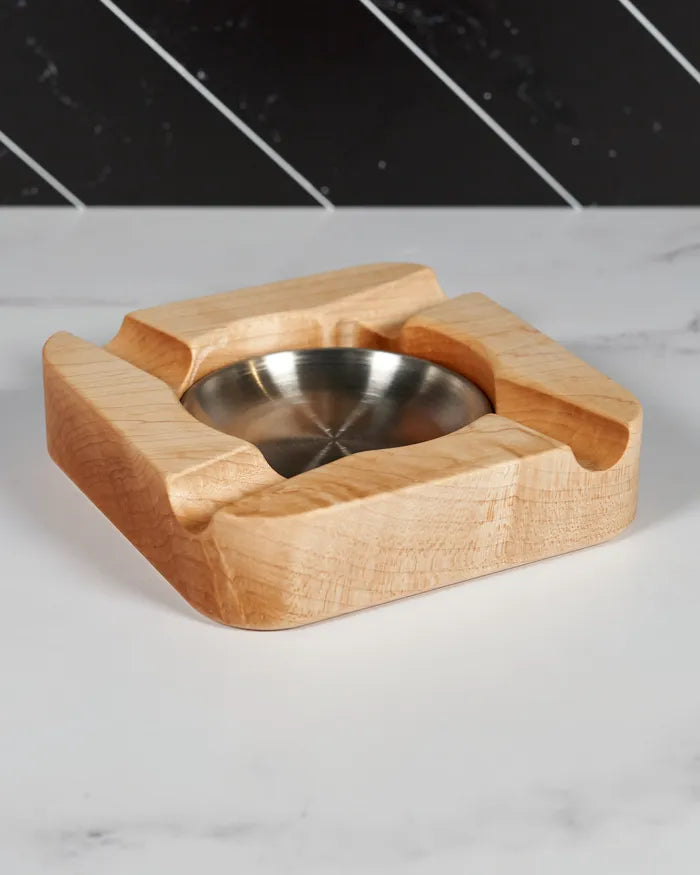 Handmade hard maple cigar ashtray with four cigar rests and a brushed stainless steel dish.