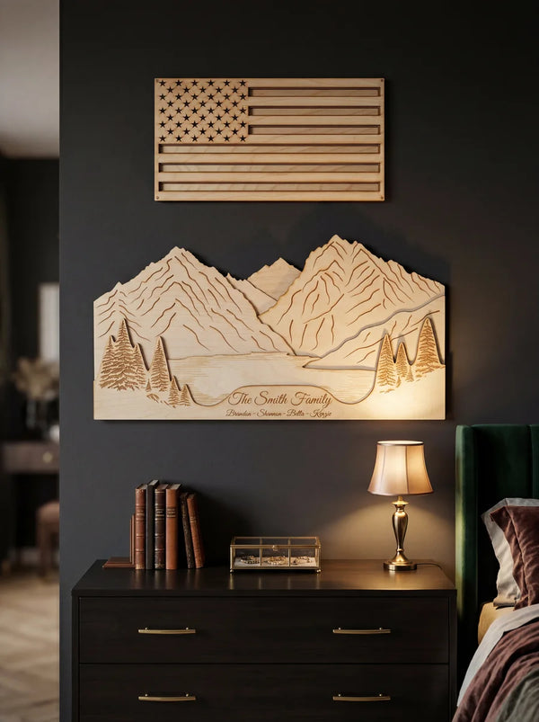 Wood American flag wall art and wood mountain landscape wall art on dark wall above console in luxury bedroom.